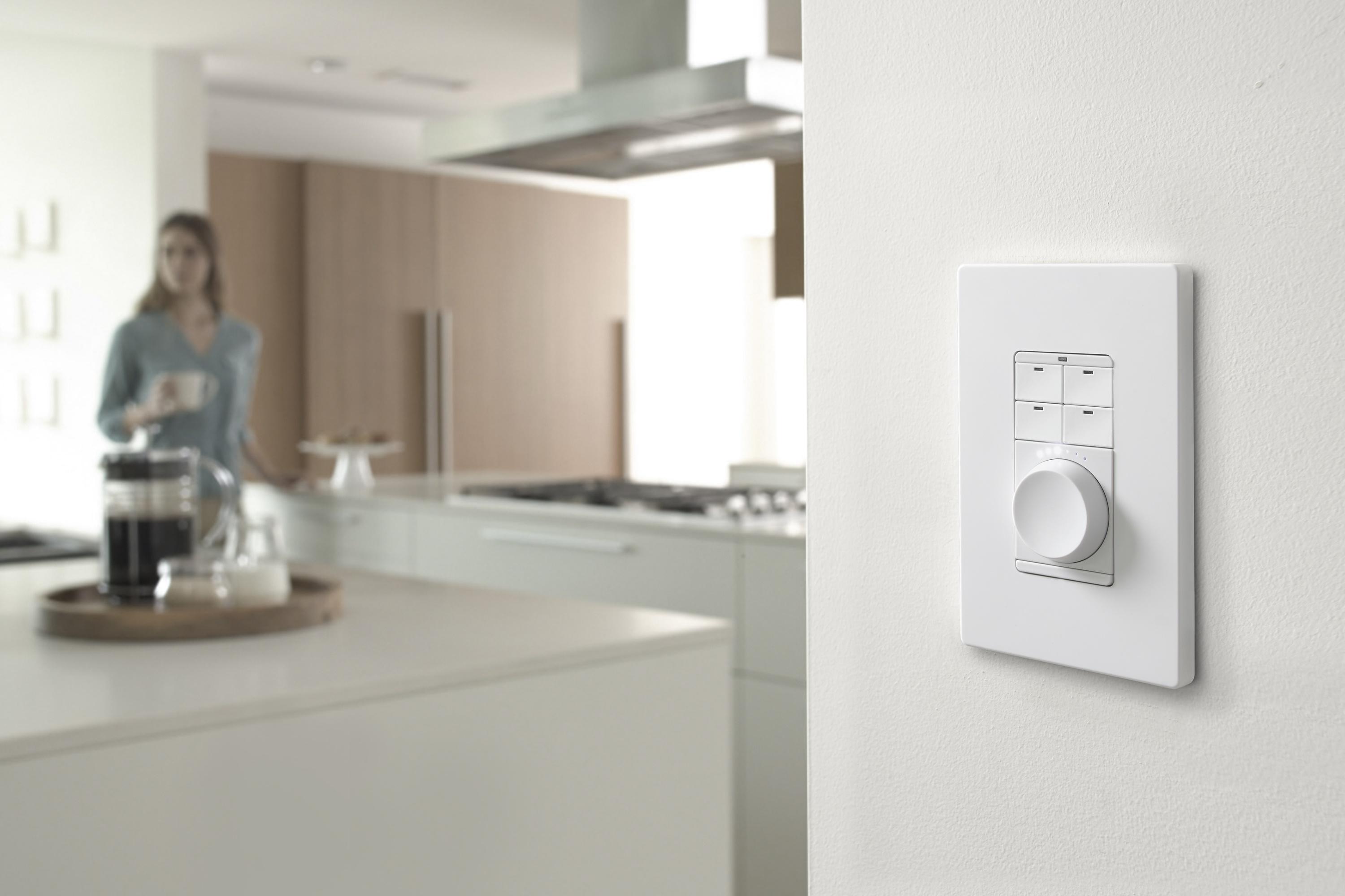 big screen displaying the av specialist logo on a home theater