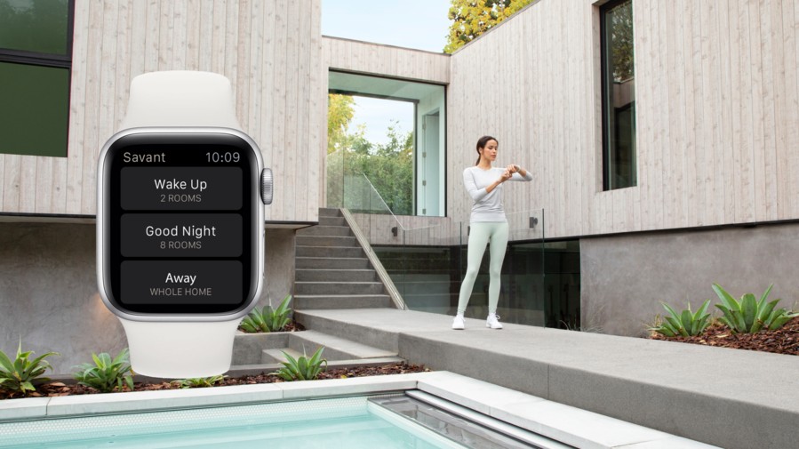 person checking the Apple Watch Savant app to manage their smart home options.
